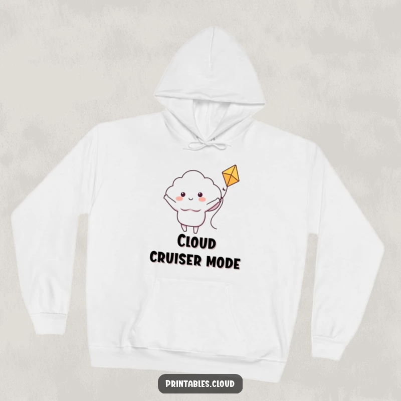 Funny hoodie with a smiling cloud character riding a kite with open arms, radiating pure bliss and a sense of adventure.