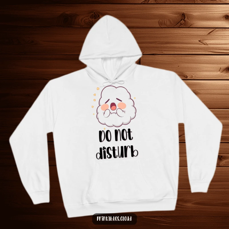 Funny Hoodie: A fluffy sleepy cloud character is yawning deeply, releasing a puff of soft, glowing dust, embodying cute and funny slumber.